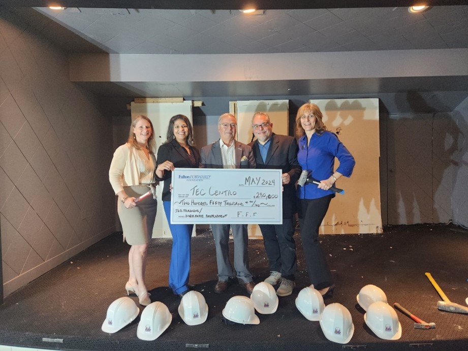 In the photo, left to right, are Kristi Heller, Fulton Bank; Maribel Torres, Lebanon WEPA Empowerment Center; Carlos Graupera, Tec Centro; Rafael Torres, Lebanon WEPA Empowerment Center; and Jill Fidler, Fulton Bank.